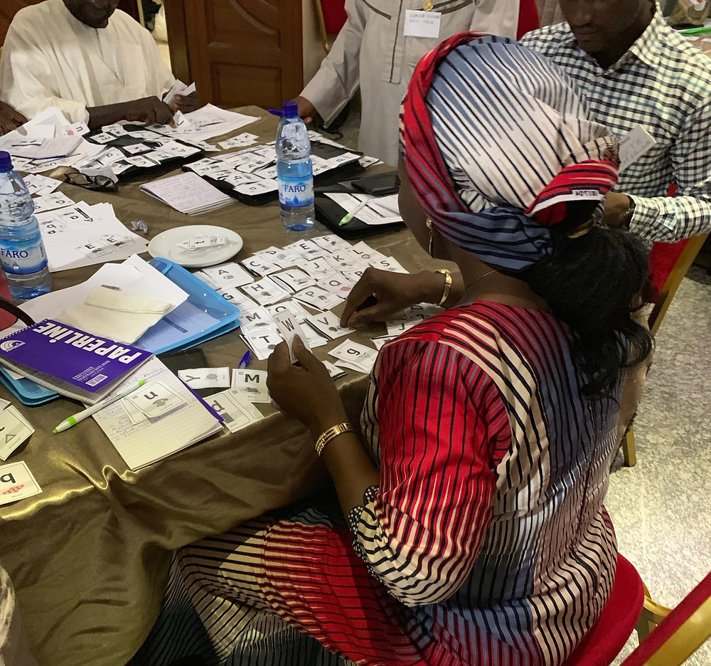 Alphabet card sorting with teachers