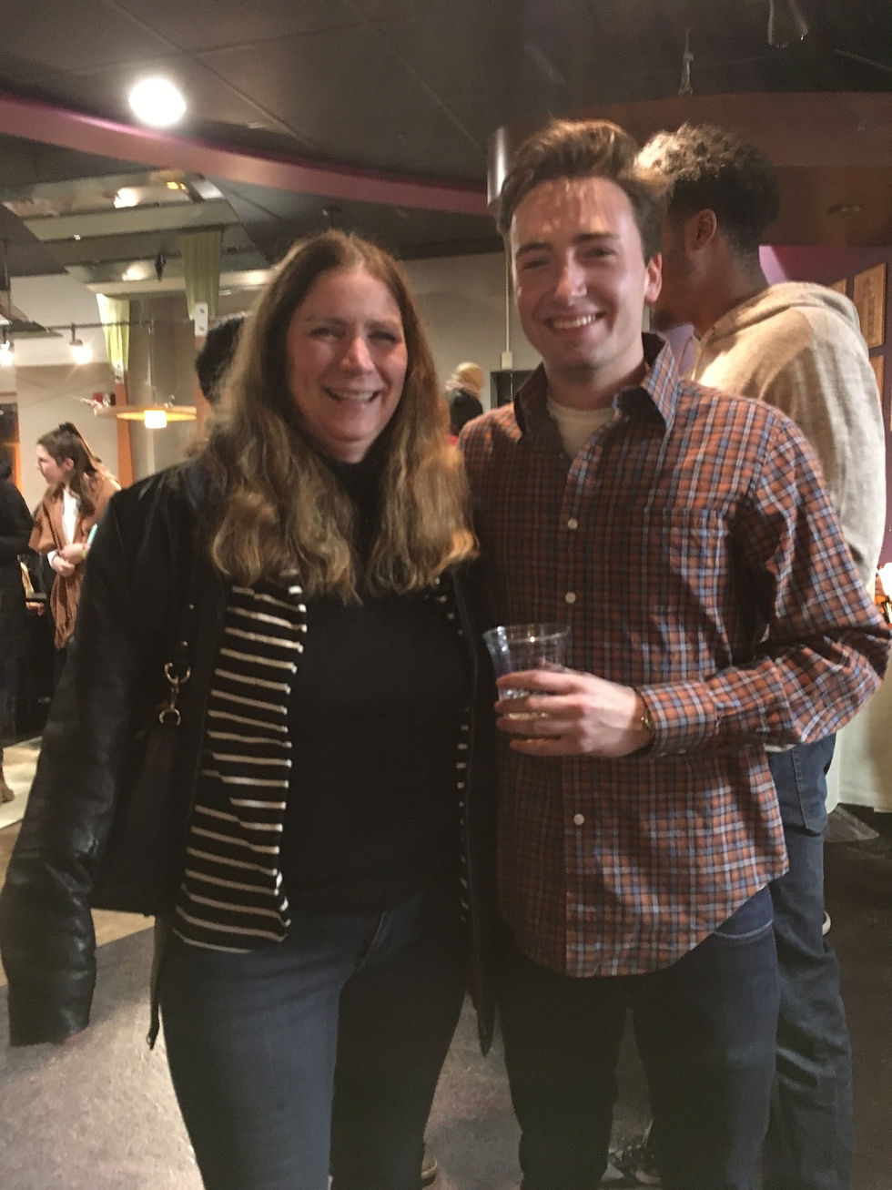 Professor Maureen Boyle smiles with senior Max Peebles at Brother Mike's.