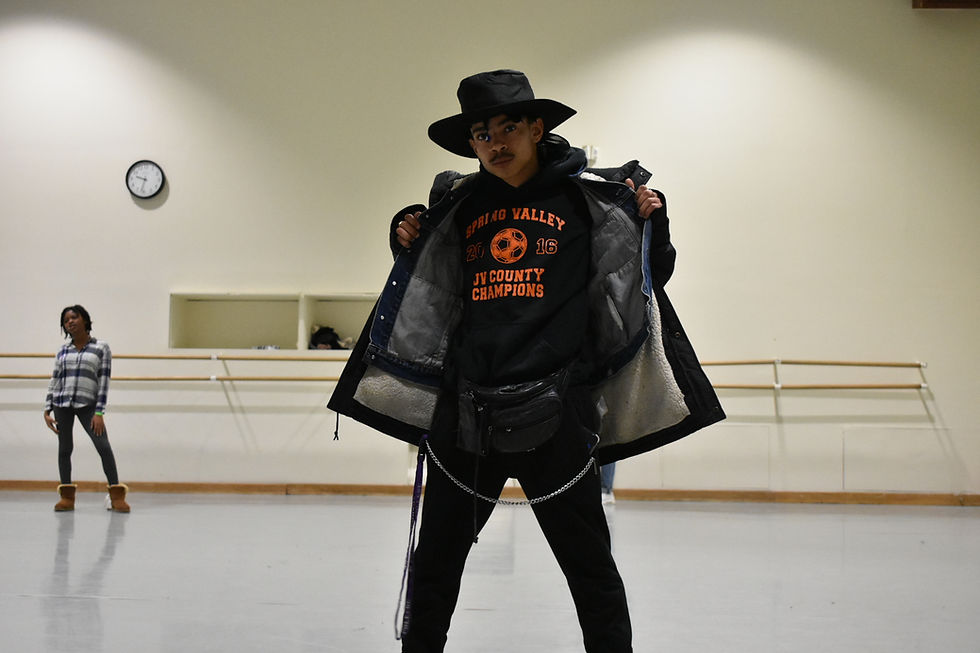 Student prepares to show off a look.