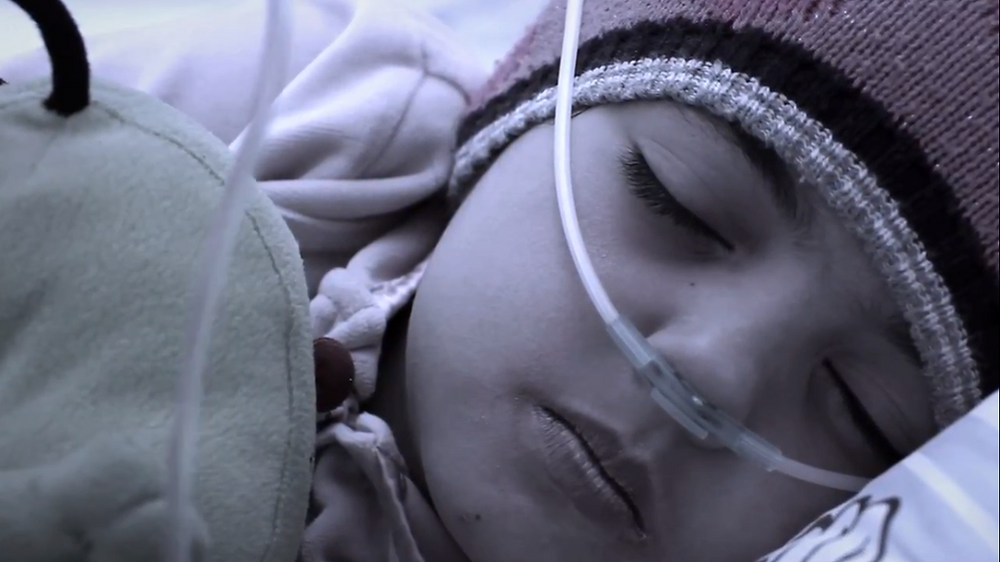 Shot of Nouha Dabani in hospital bed in 'Salima'