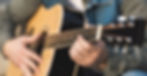 Acoustic guitarist playing easy guitar songs.