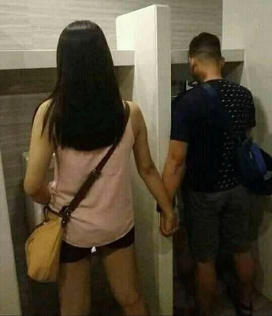 Together at the urinal guy & transvestite