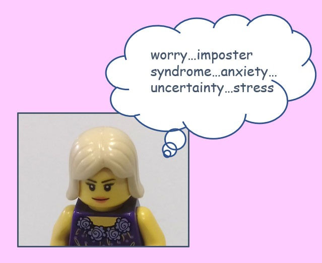 Lego person with thought bubble
