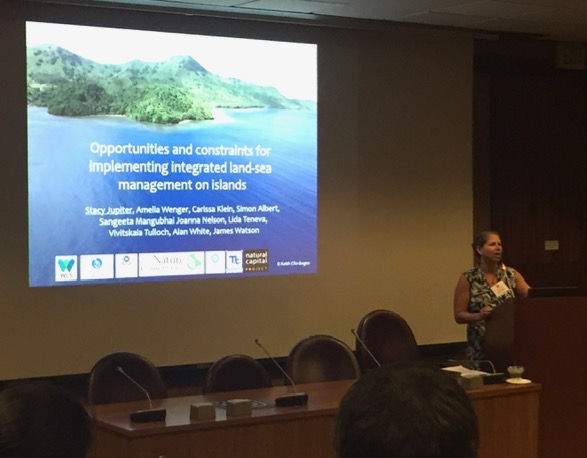 Dr. Stacy lecturing at a marine ecology conference