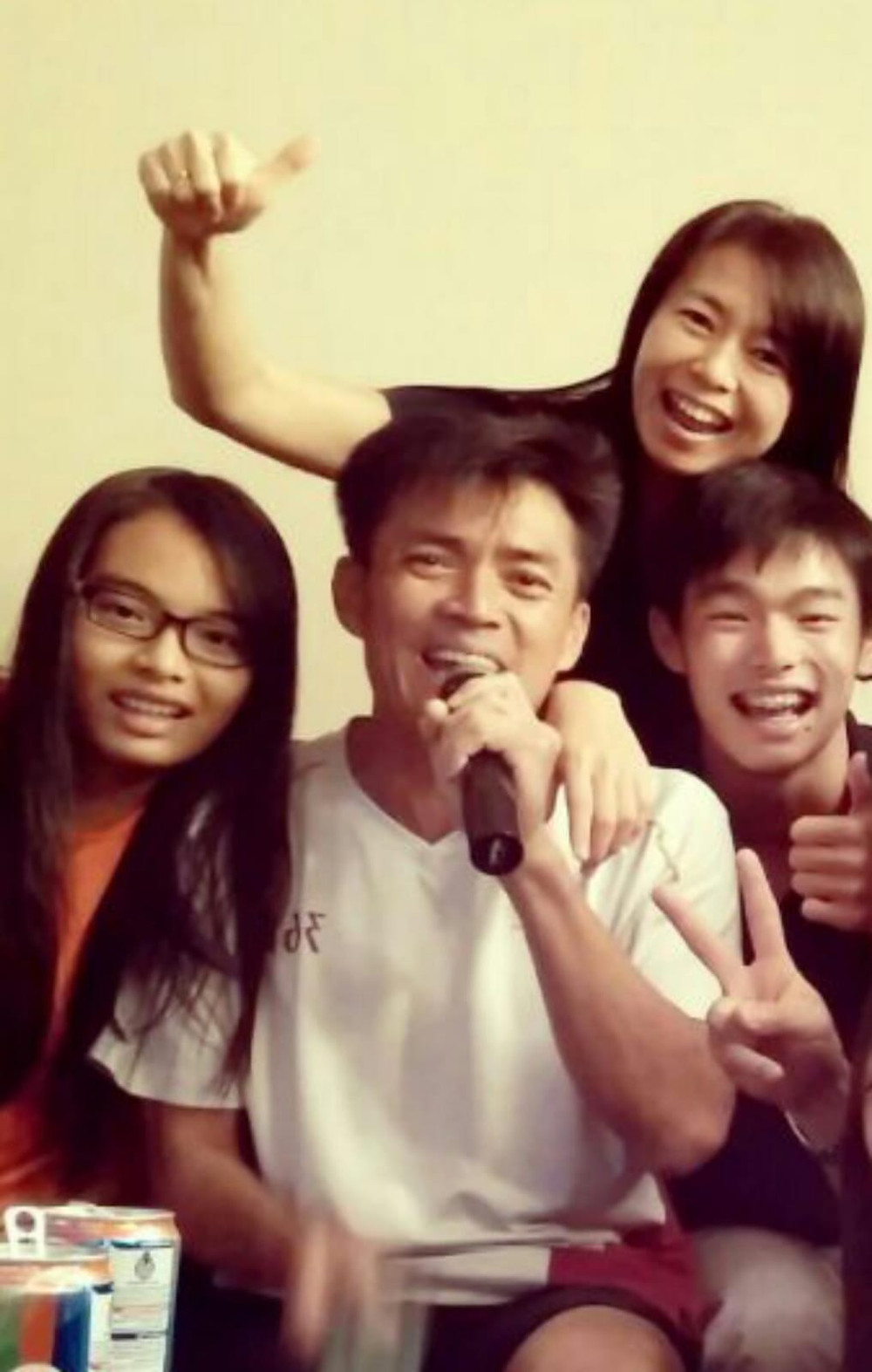 Mr Melvin Tan and his family