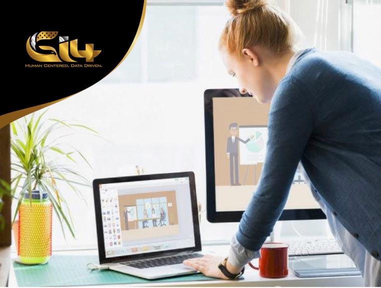 Woman working on computer with animation software
