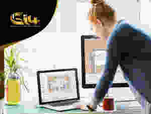 Woman working on computer with animation software