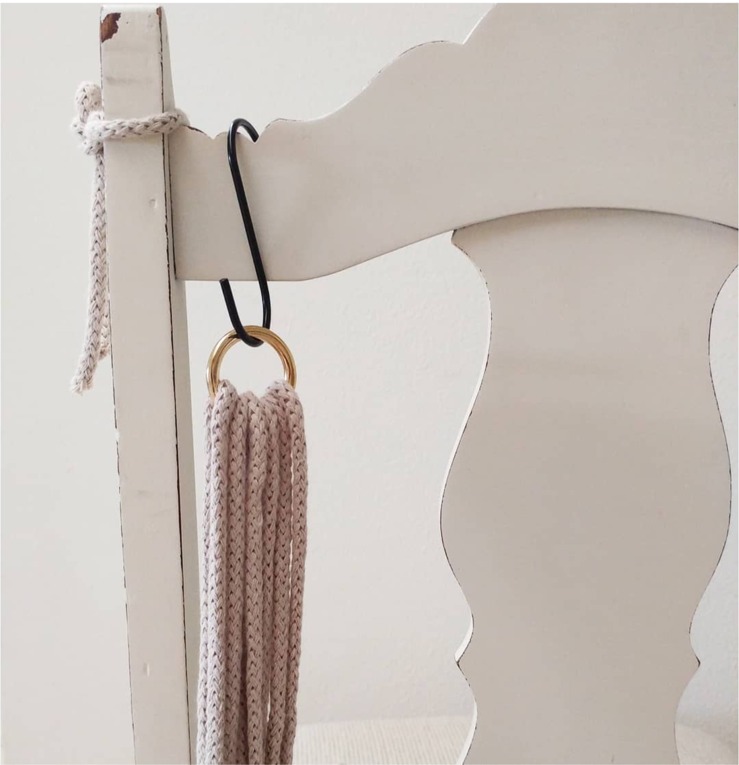 S-hook on the back of a chair