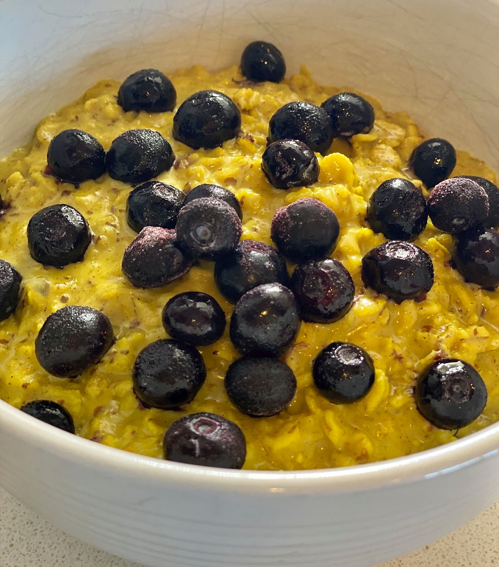 Golden Tumeric Oatmeal with blueberries on top