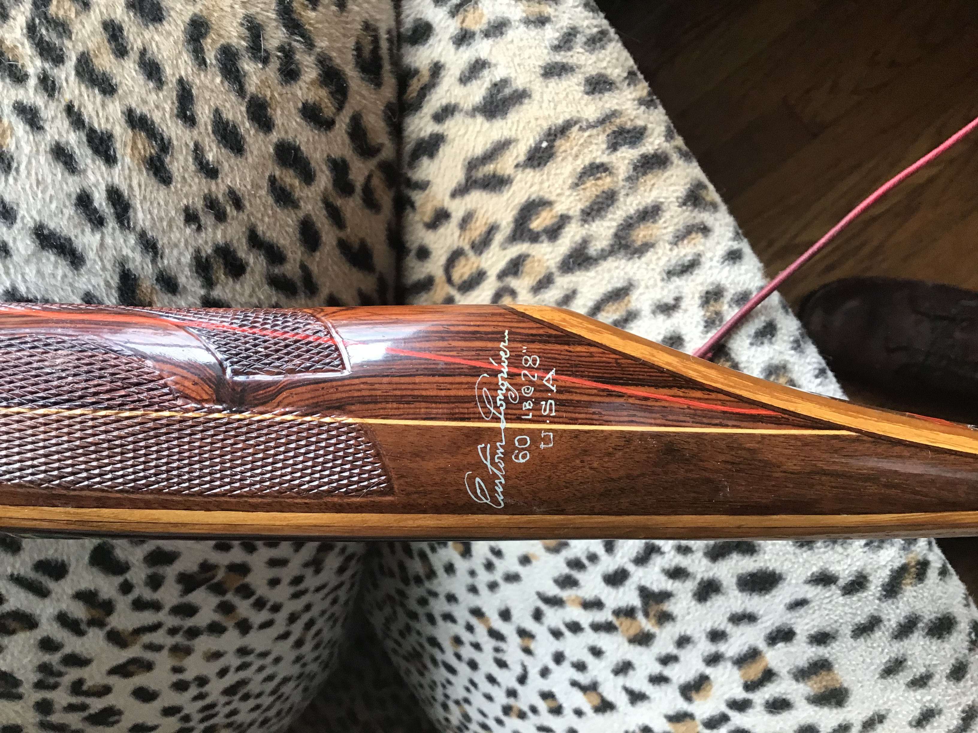 Custom Long River long bow right hand 62inch 60@28 outstanding checkering . By Gus delagofa . Very hard to find one of his bows $500 shippe content media
