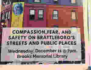 poster advertising talk on compassion and fear in downtown Brattleboro