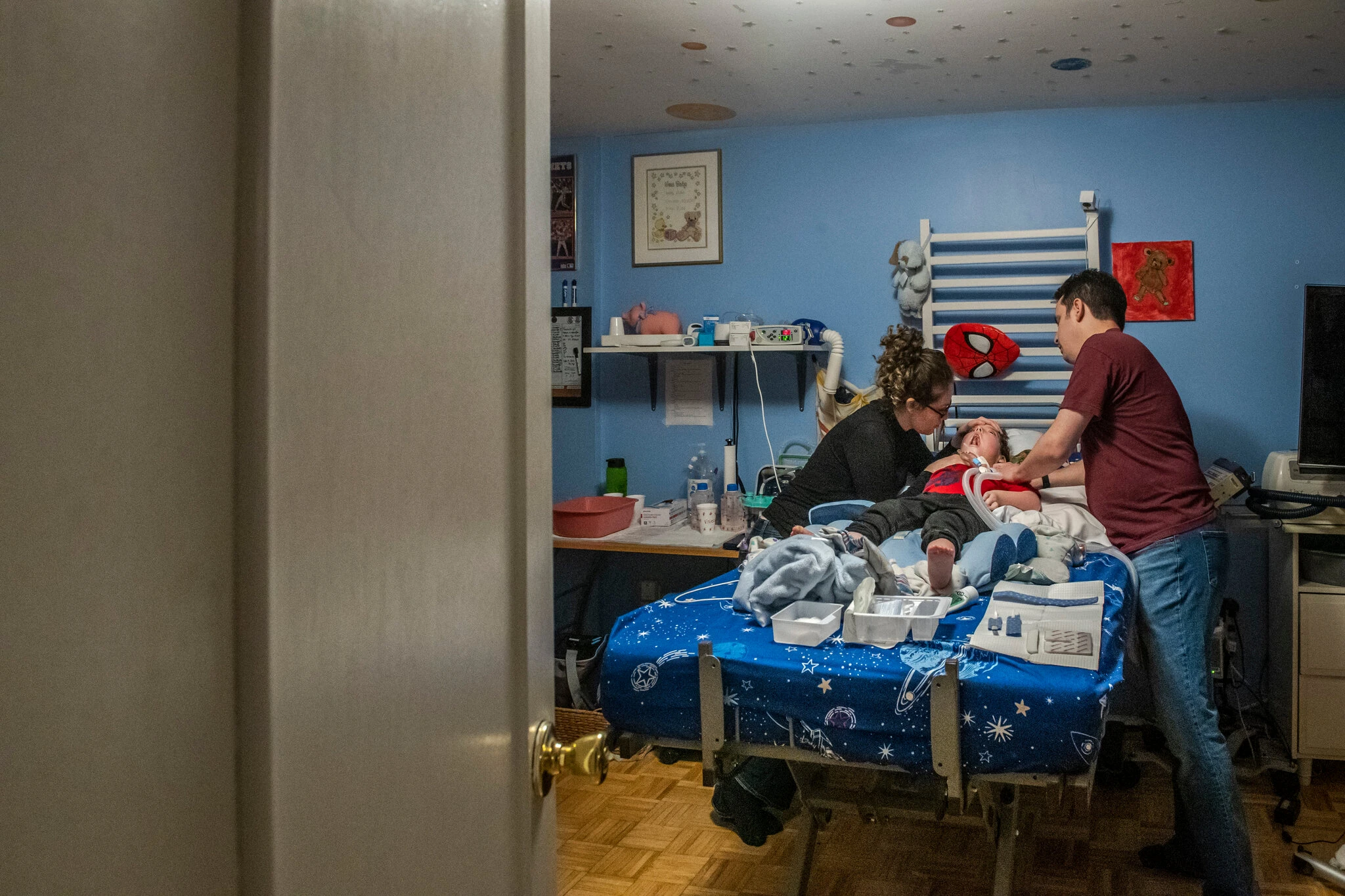 To Keep Their Son Alive, They Sleep in Shifts. And Hope a Nurse Shows Up. content media