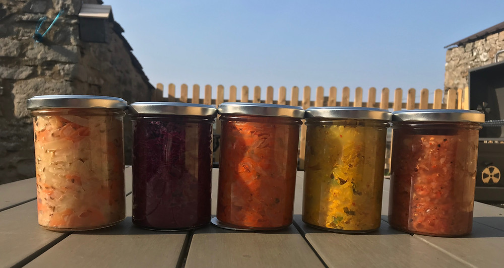 Live fermented vegetable products including sauerkraut and kimchi