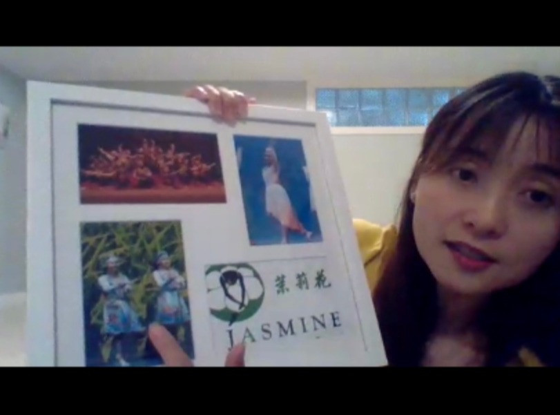 Executive Director Ella Shan displays a senior gift.