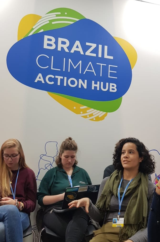 Denize speaking during at the Brazil Climate Action Hub