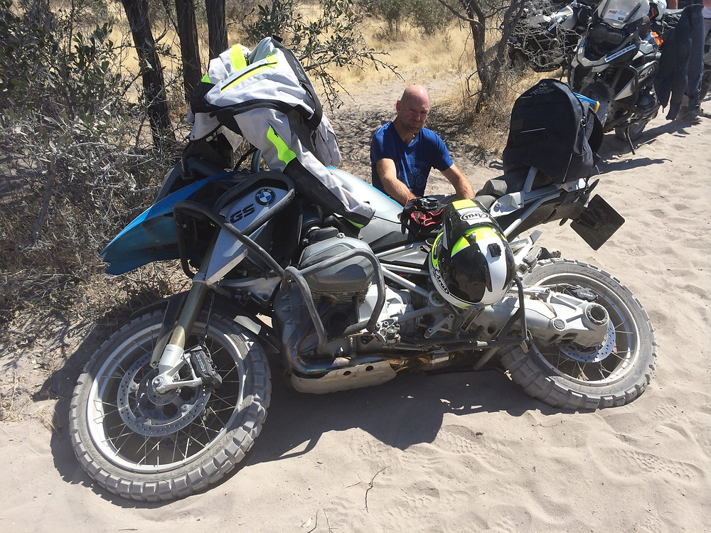 Adrian Newey rides motorcycle
