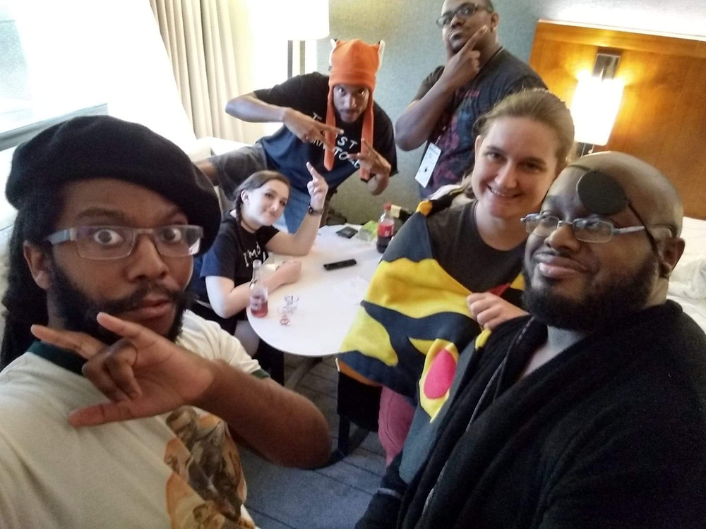 A group of friends playing the popular game Black Card Revoked at Blerdcon