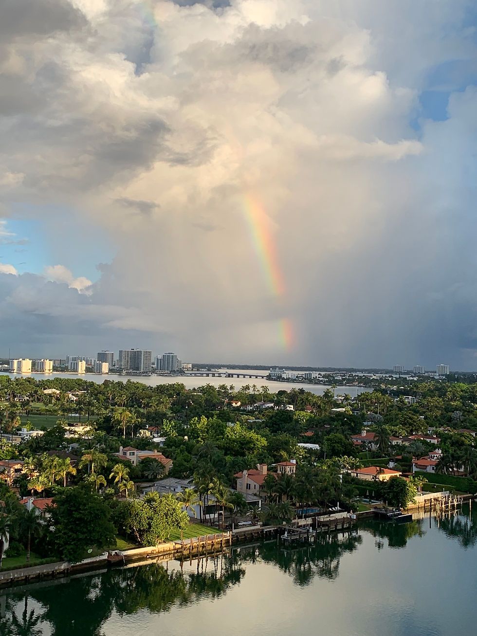 The S-Team celebrates the rainbow, a symbol of new beginnings, especially in real estate.