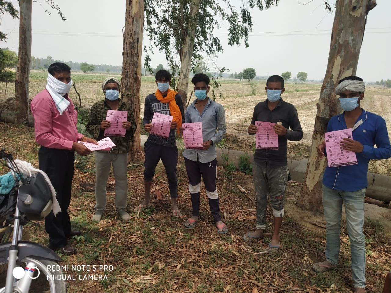 Spreading awareness and distributing medicines and mask among Servicemen and Labourers of Haryana content media