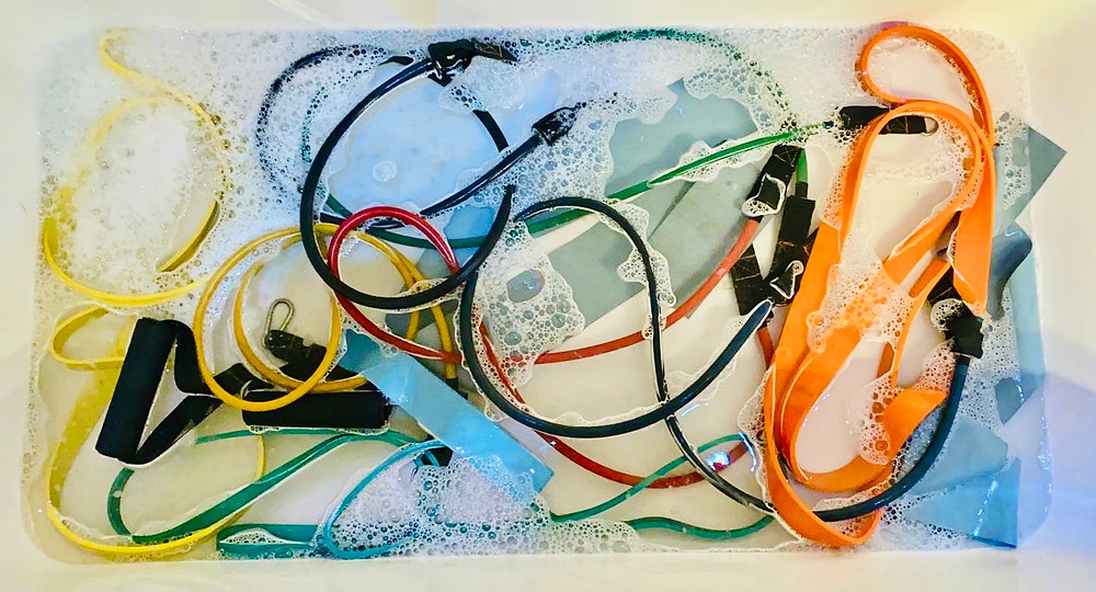 Cleaning gym resistance bands.