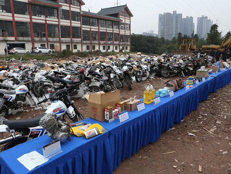 九龙坡警方举行集中销毁假冒伪劣商品活动