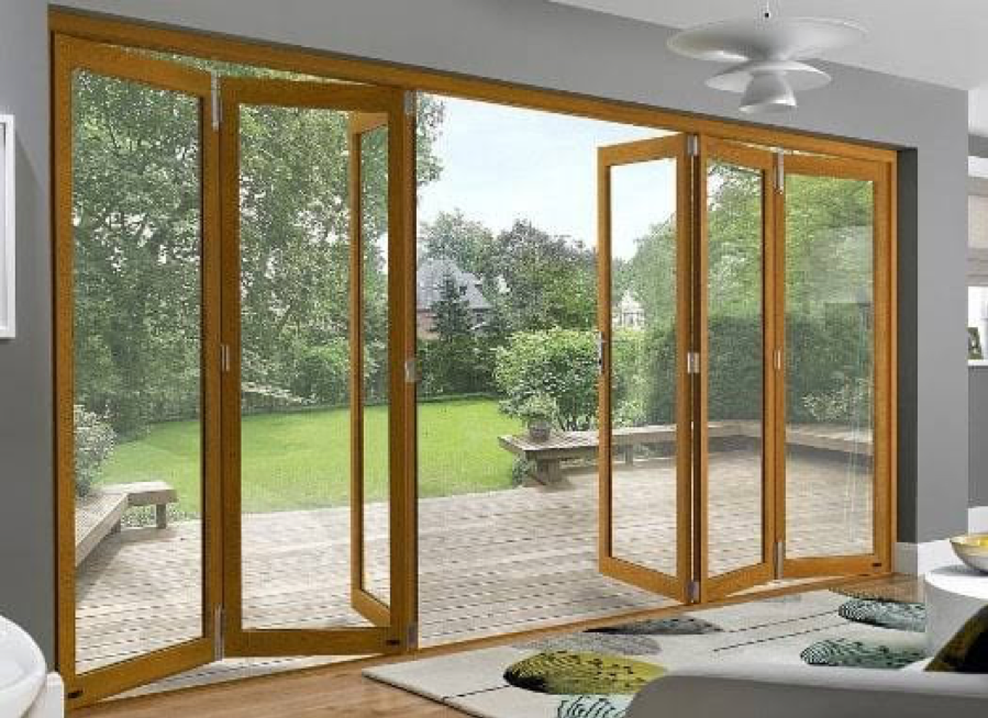 Similar to the single-hinged doors, individual folding door panels are the major essence of these Bi-fold doors. They can be frameless or framed both. The surprising part of this door type is, it can be pushed to both sides of their structural openings. They might have more than two hinges that concertina or fold along a static track. Surprisingly, it creates an elusive scenario that makes your interior seem bigger as the walls don't have any structural obstacle. You can absolutely enjoy these both inwards and outwards opening bi-fold doors once fit in your lovely home.