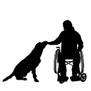 dog sitting next to person in wheelchair