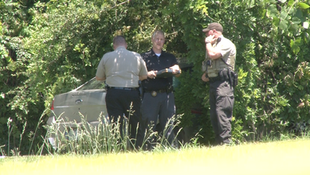 Two Henry County teenagers arrested after man found dead in crashed car