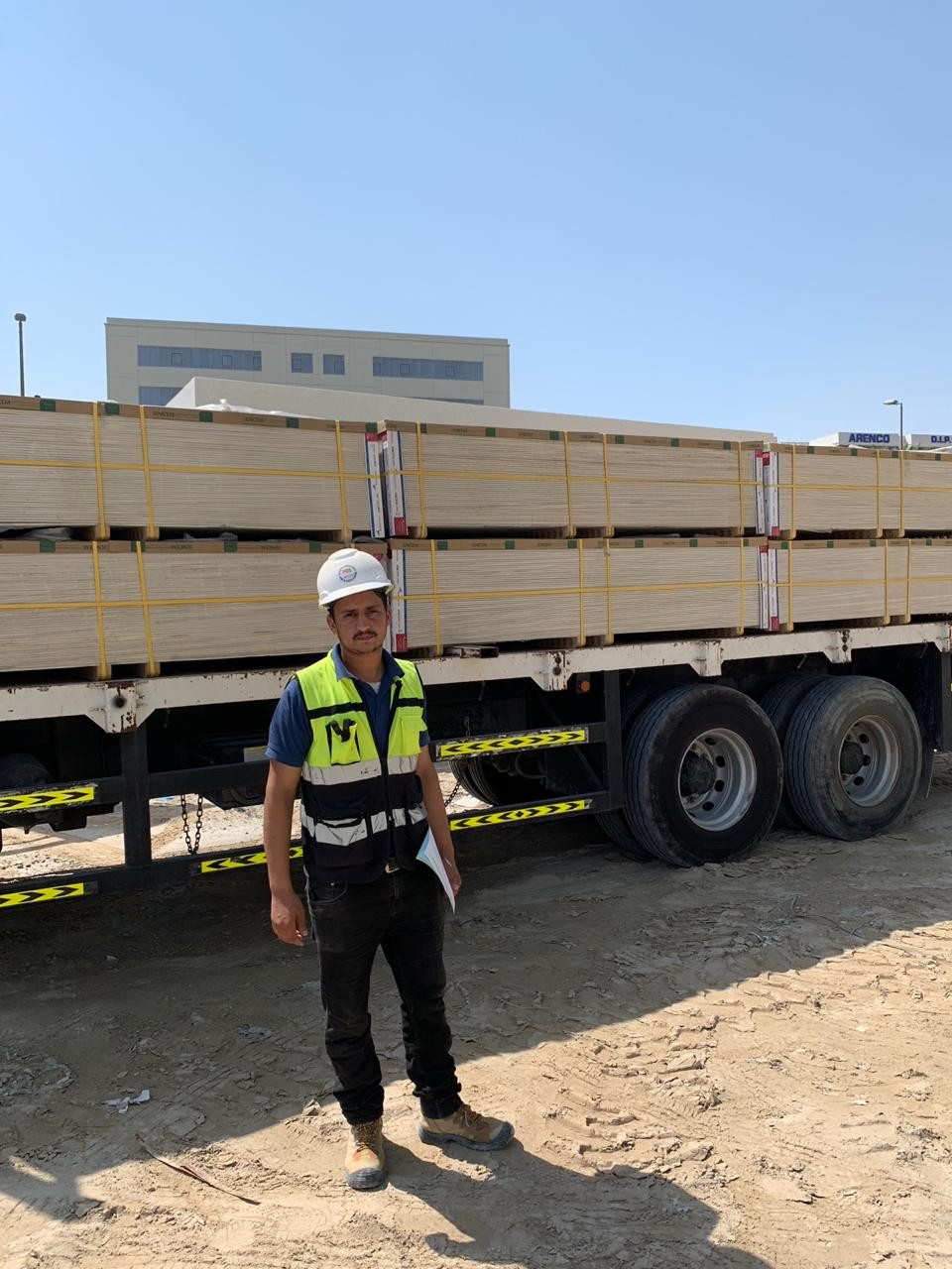 ECOCON storekeeper is accepting cement fibre boards delivered to DIP site