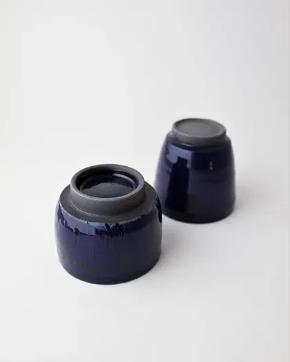 black porcelain ceramic cups glazed and wheel thrown