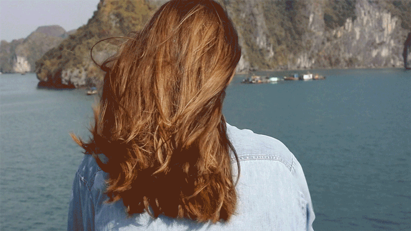 When the sunlight hits brown hair it reflects a different hue than black hair.