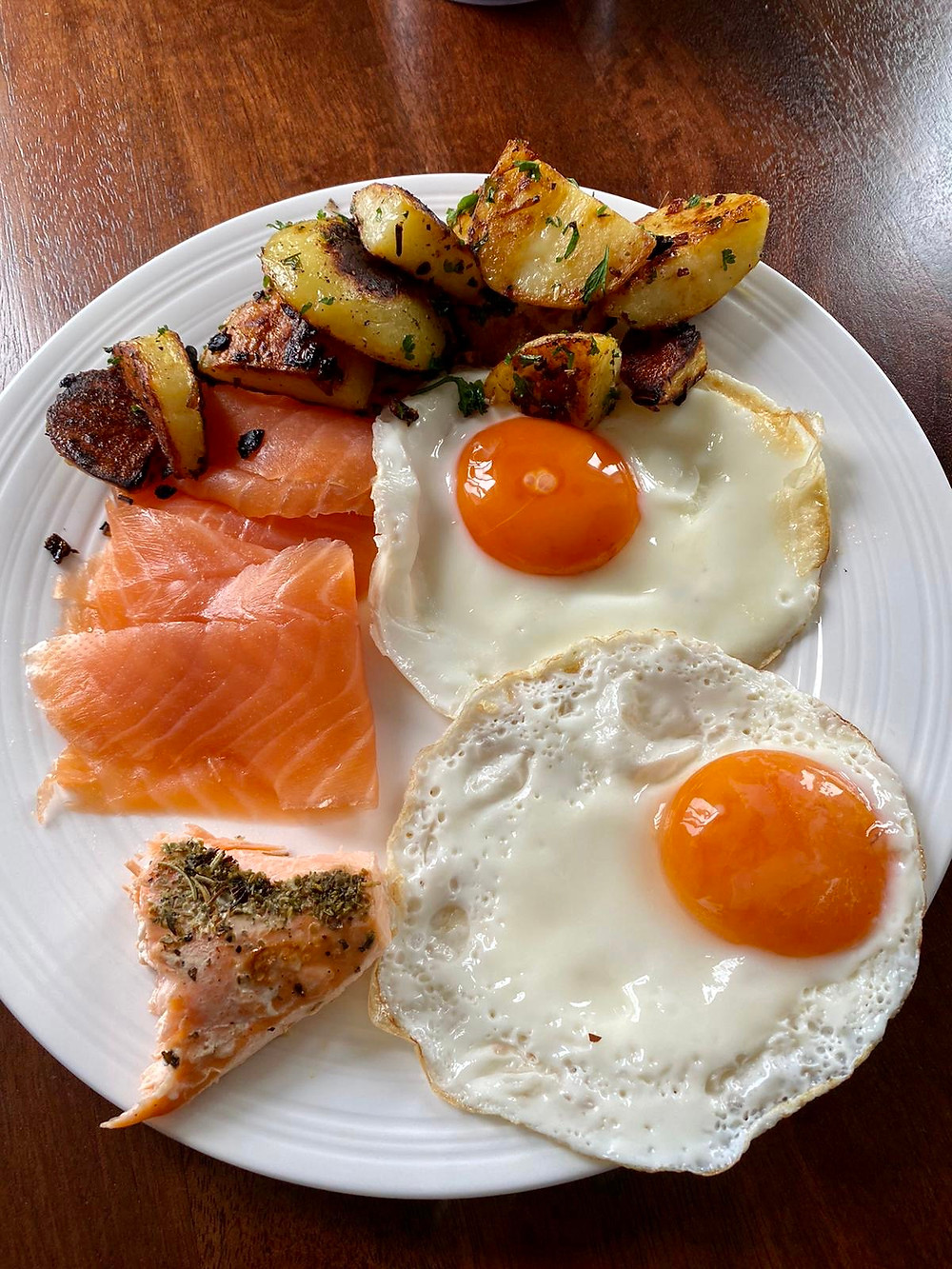 A plate of fish and eggs.