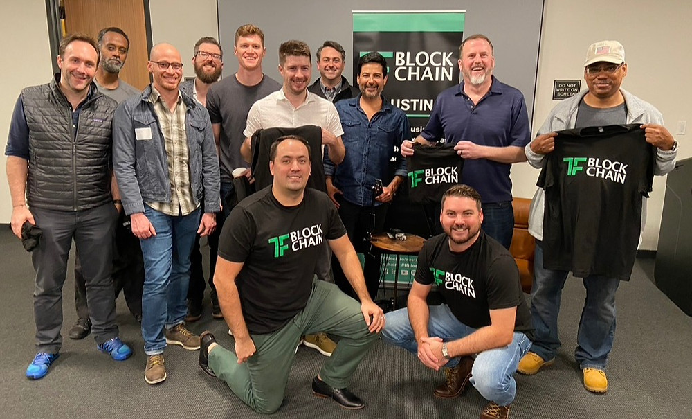 David Kemmerer, Kurtis Friesen (TF Austin Chapter Director), and the Austin community pose for a picture after the Fireside Chat.