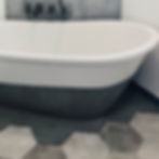 MAAX SAX bathtub sprayed with GFRC with custom concrete surround.
