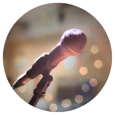 A microphone sitting on a stand.