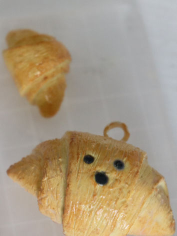a polymer clay croissant with bear face: made at a polymer clay workshop in toronto
