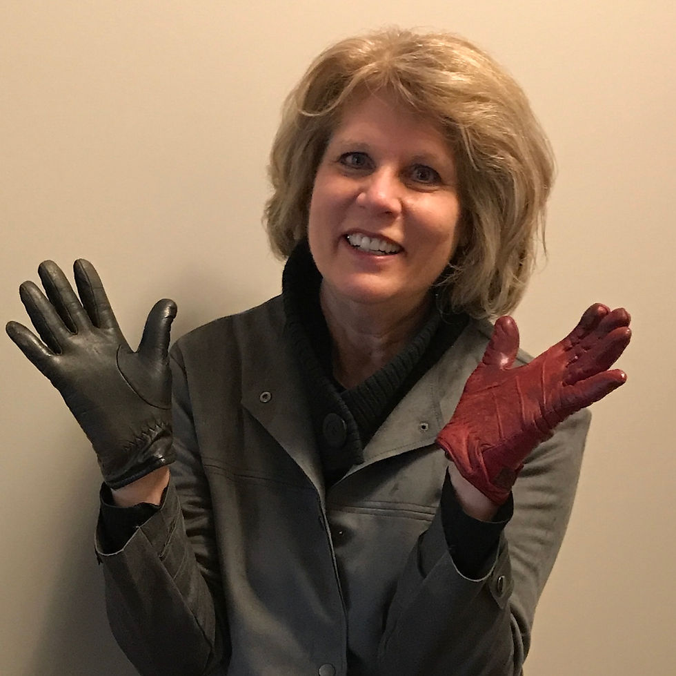 Kate Moynihan artist, sometimes accidentally wearing one red, one black glove