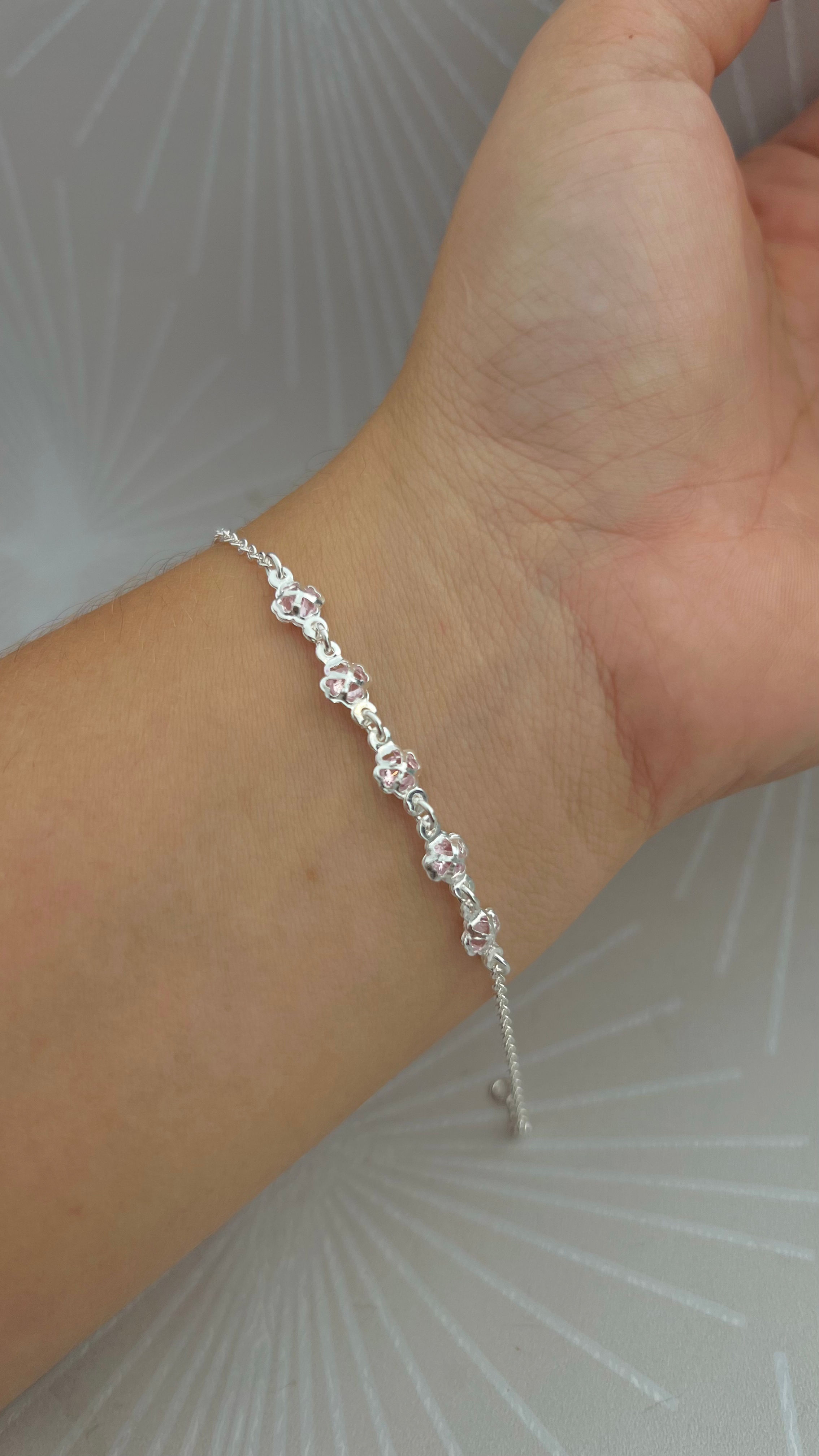 Pulseira florzinhas rosas 