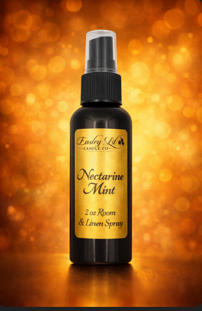 "A new Nectarine Mint Spray Bottle placed beside an Easley lit candle, creating a fresh and inviting atmosphere."