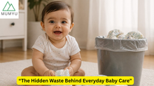 "Baby beside a bin filled with used disposable nappies, highlighting diaper waste"
