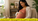 "Soft lifestyle image of a pregnant woman embracing prenatal wellness"