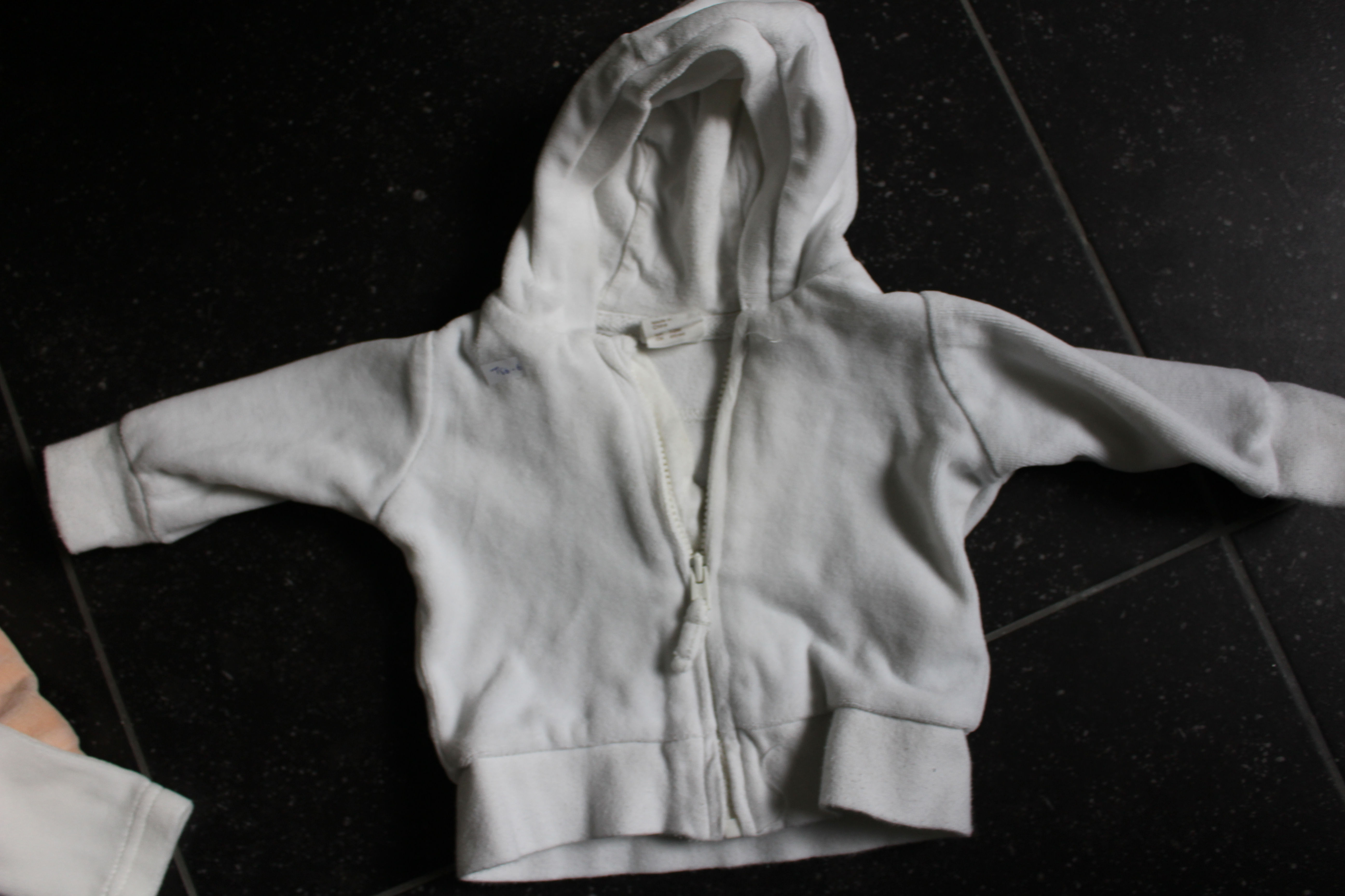 Gilet blanc cassé à capuche