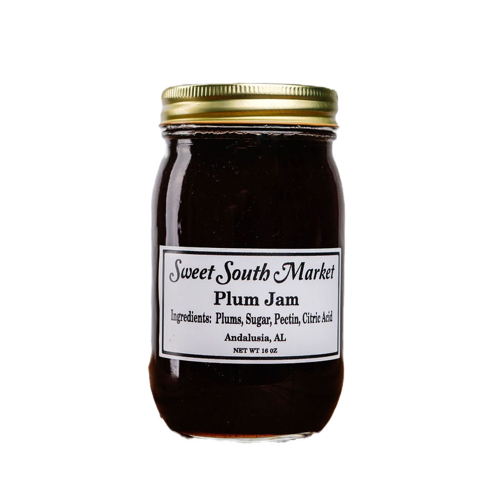 Jar of Sweet South Market Plum Jam, ingredients listed, ready to eat.