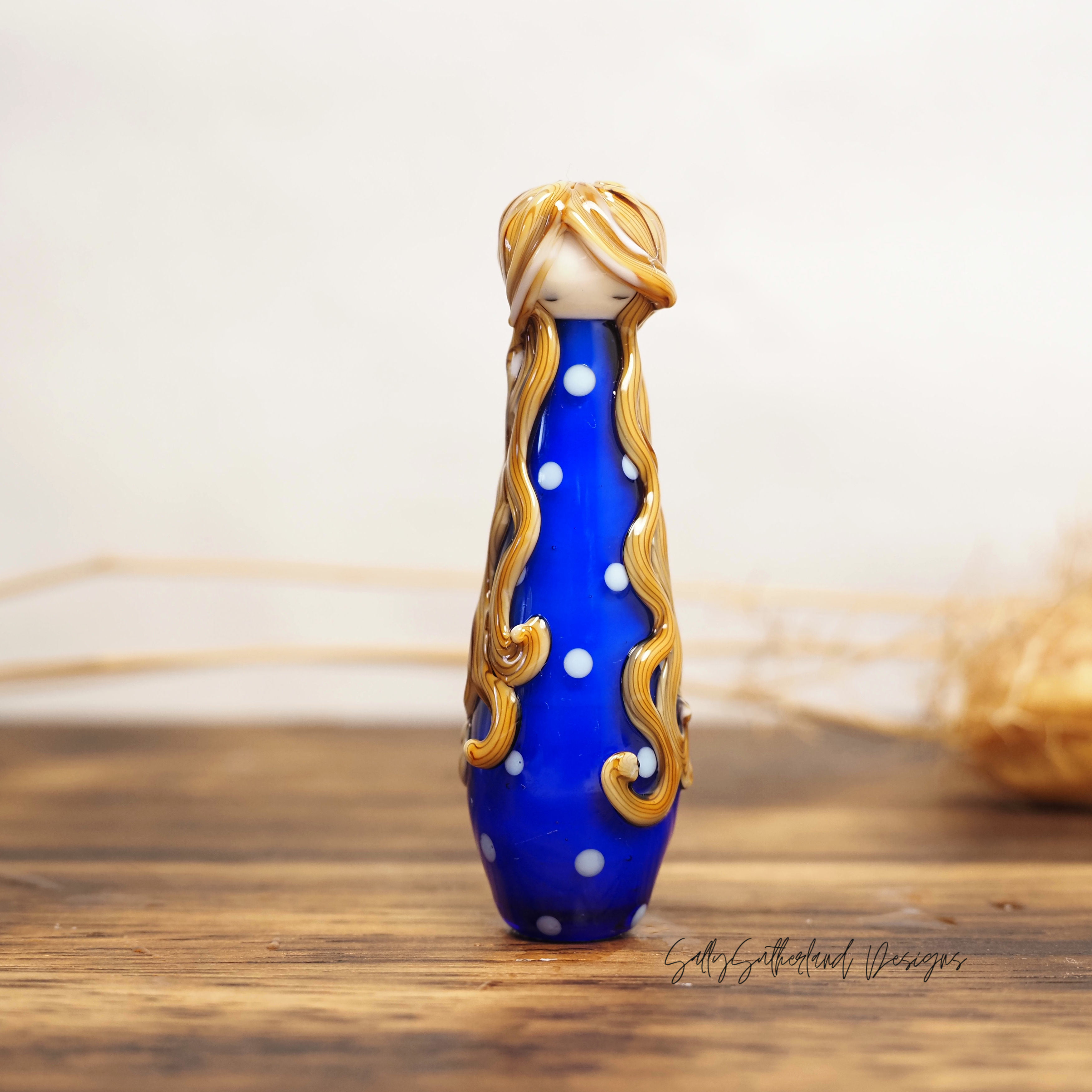 Lost Girl, Doll Bead