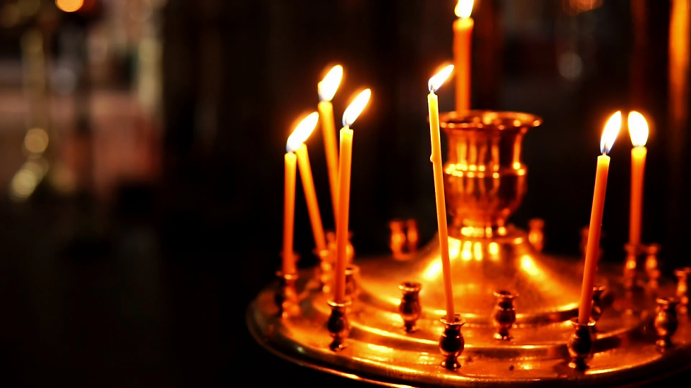 golden-orthodox-candle-holder-burning-fo