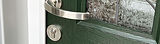 Composite front door in green with decorative glass