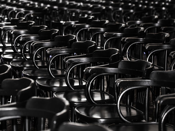 lot-of-black-wooden-chairs-stand-in-a-diagonal-2025-03-14-23-57-25-utc.jpg