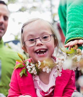 Smiling girl with flowers