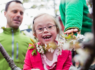 Smiling girl with flowers