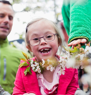 girl with glasses smiling